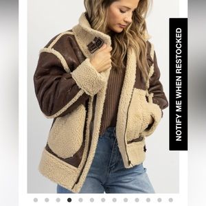 Brown leather coat with faux fur